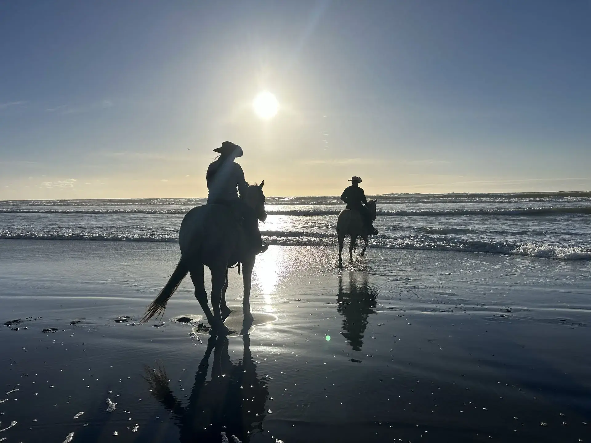 Zachary Riding on the beach