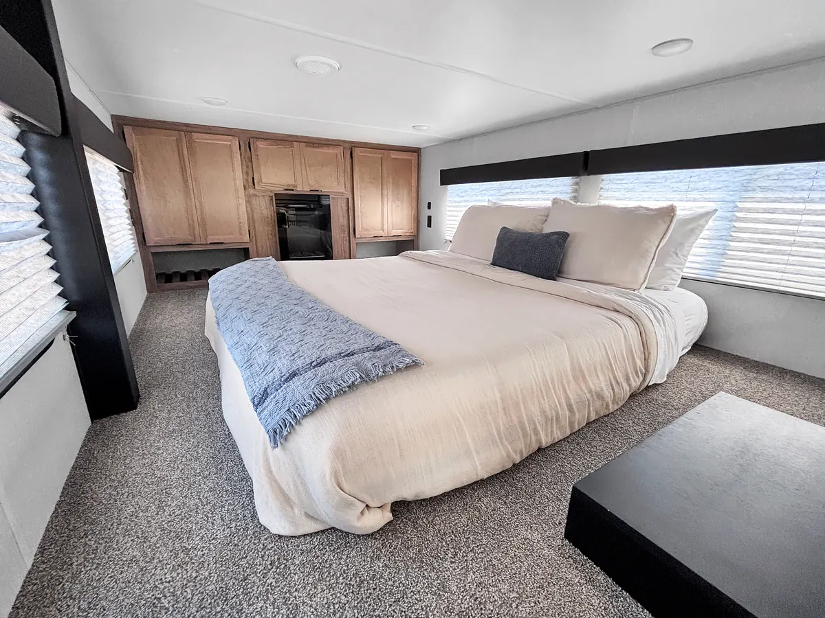 King bedroom with windows on three sides at Ocean View Stables, Daly City