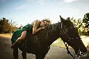 Green Dress on horse.webp